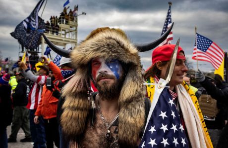 QAnon Shaman explains lawsuit against Trump