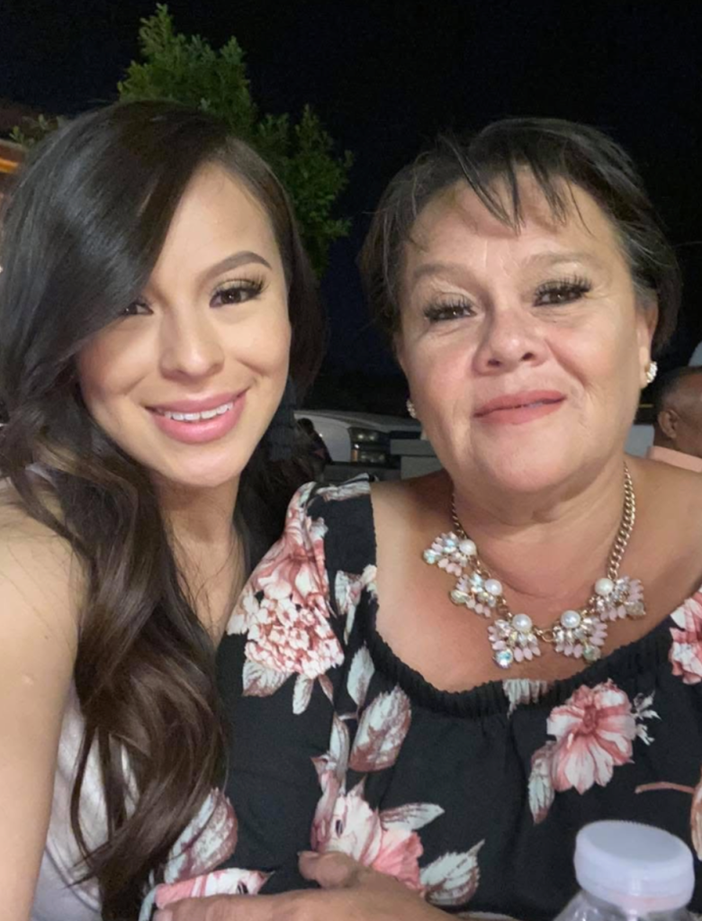 two women in dresses