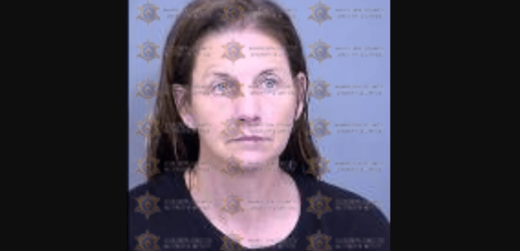 a mug shot of a woman