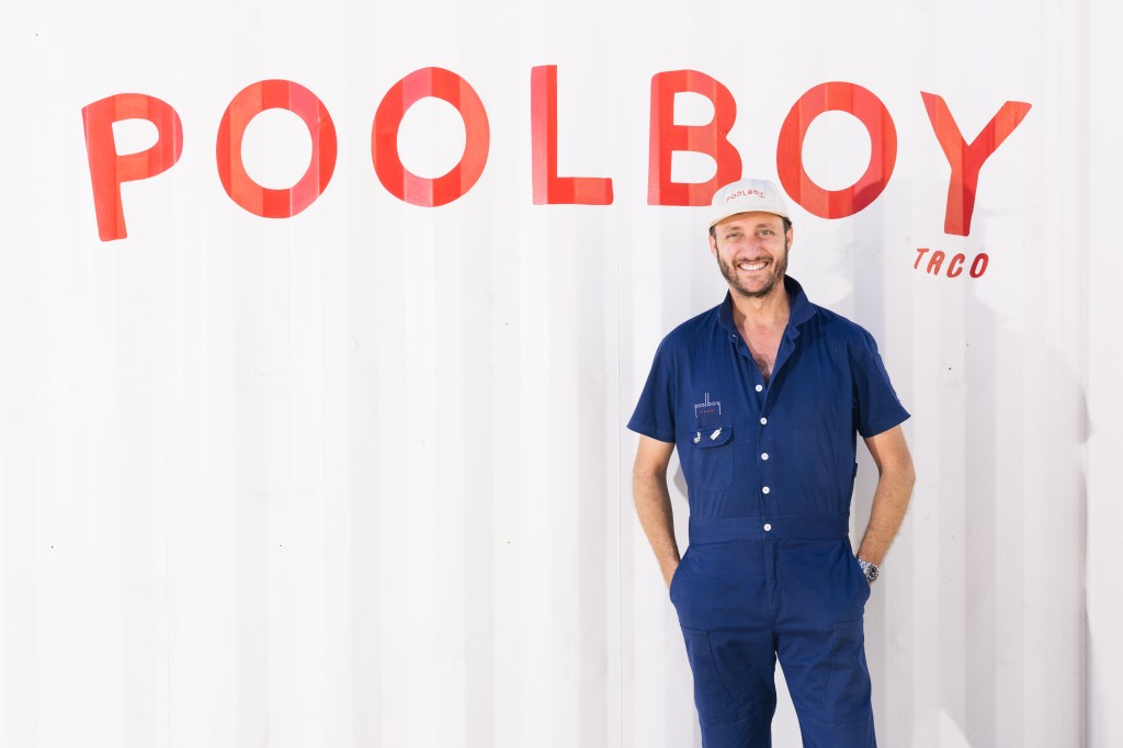 Man standing in front of a shipping container