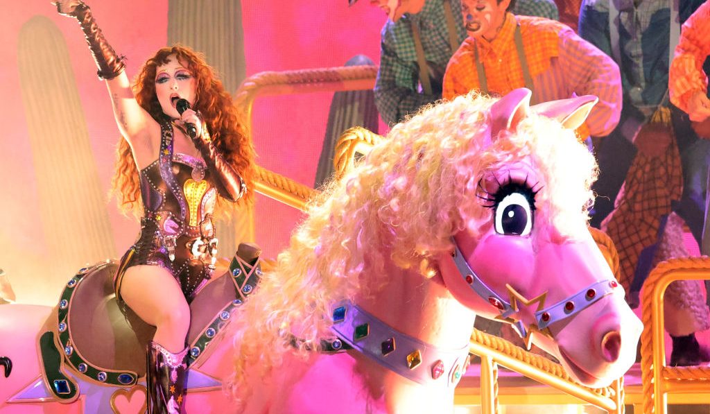 chappell roan singing on a pink pony