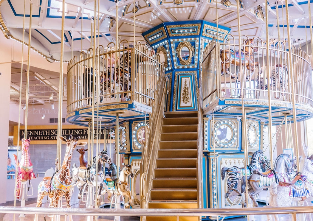 A carousel inside a suburban mall.