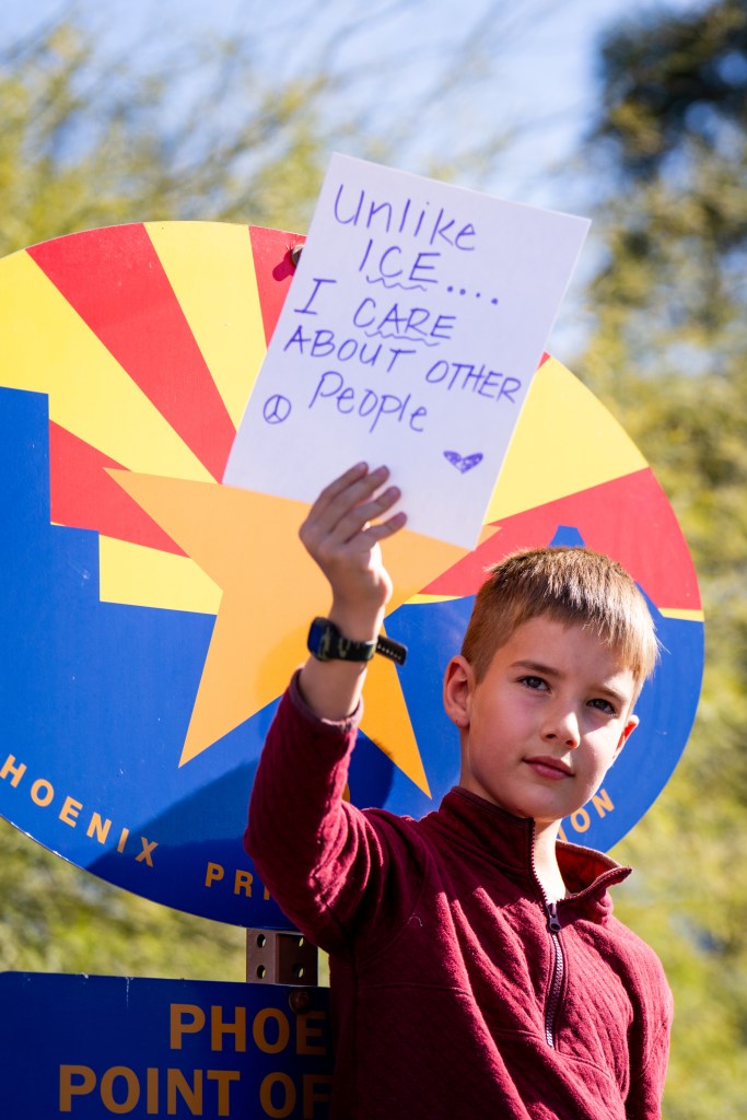 protesters at an anti-ice rally