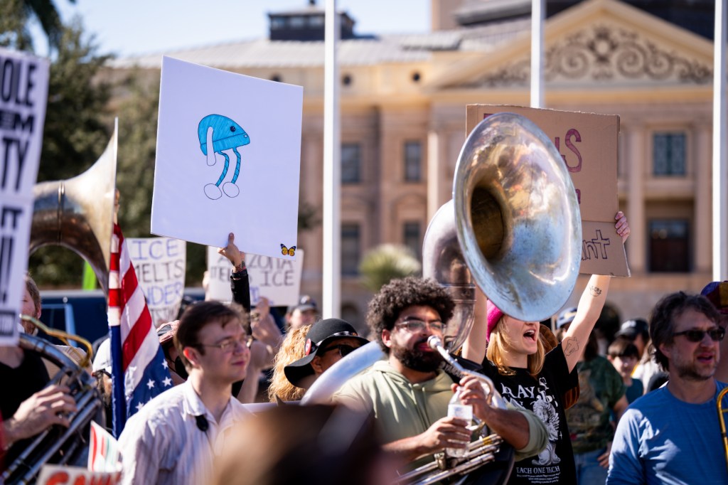 protesters at an anti-ice rally