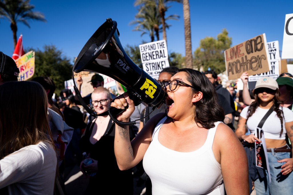 protesters at an anti-ice rally