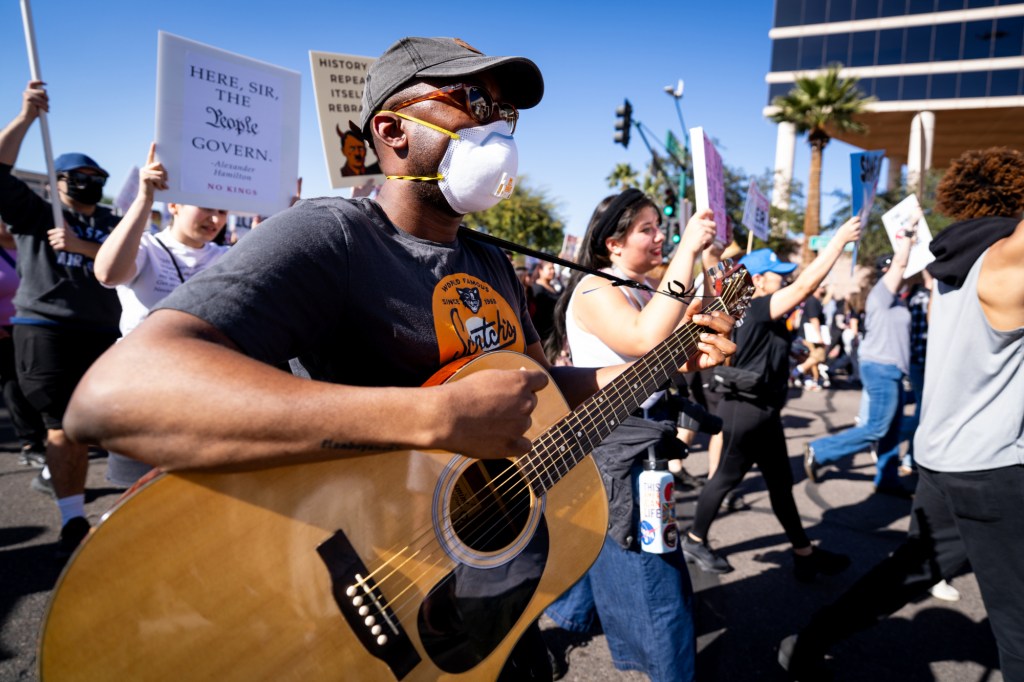 protesters at an anti-ice rally