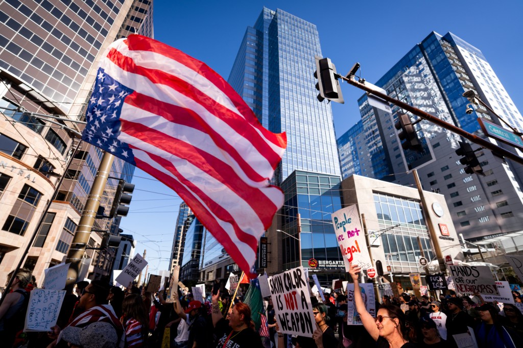 protesters at an anti-ice rally