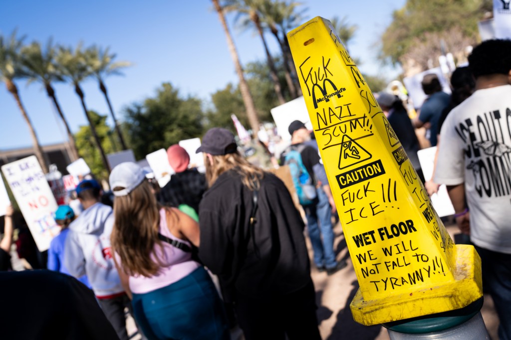 protesters at an anti-ice rally