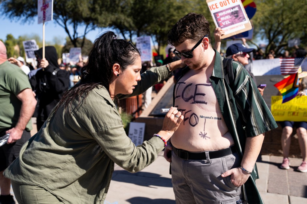 protesters at an anti-ice rally