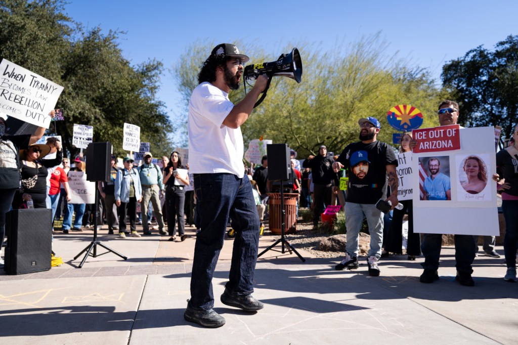 protesters at an anti-ice rally