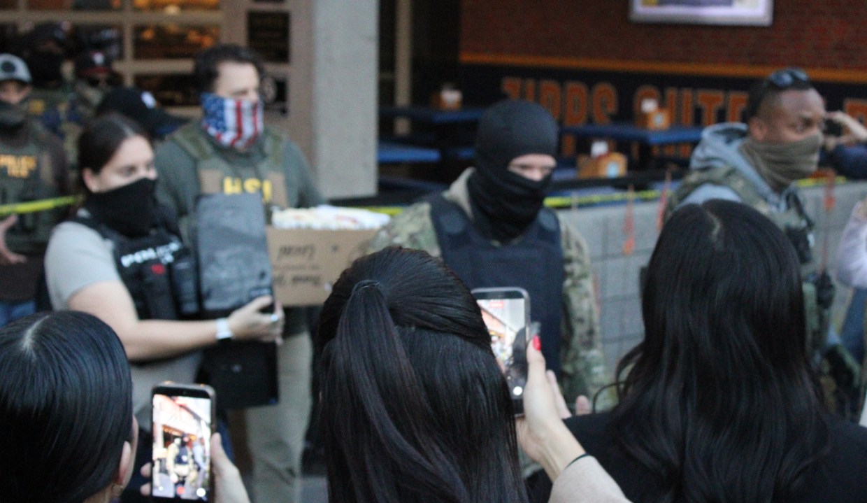 protesters film ice agents