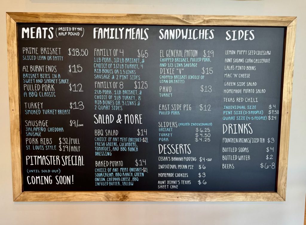 A barbecue restaurant chalkboard menu.