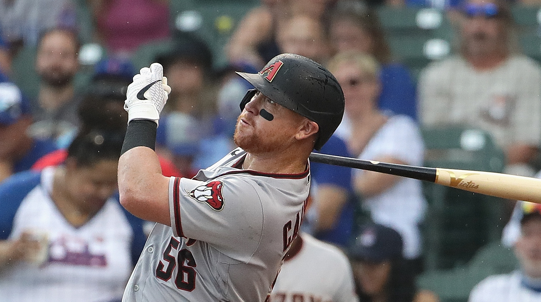 kole calhoun in a diamondbakcs uniform