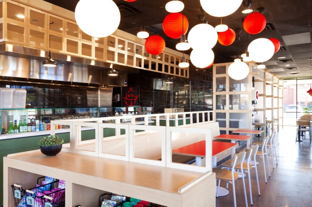 Dining room of a fast-casual Asian restaurant.