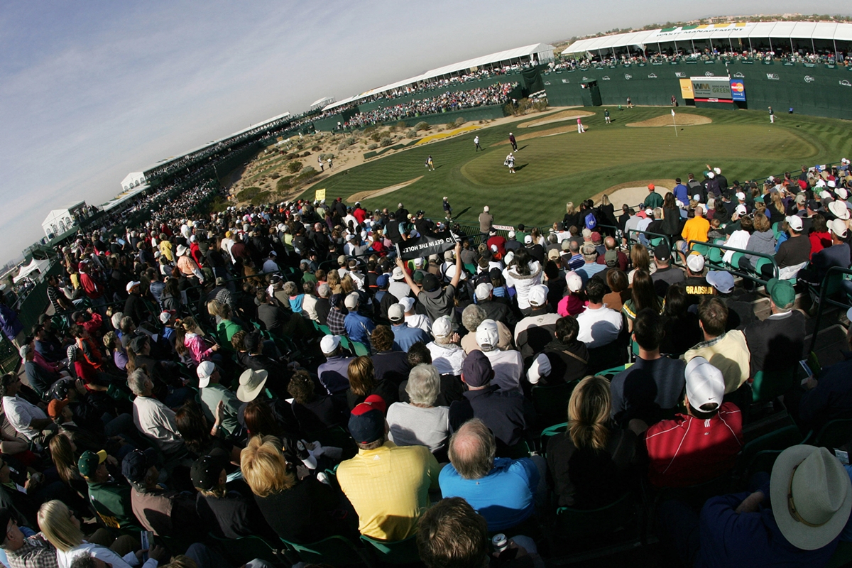 Fans pack the stadium-style 16th hole at TPC Scottsdale during the WM Phoenix Open, Arizona’s largest annual sporting event and one of the PGA Tour’s most distinctive stops.