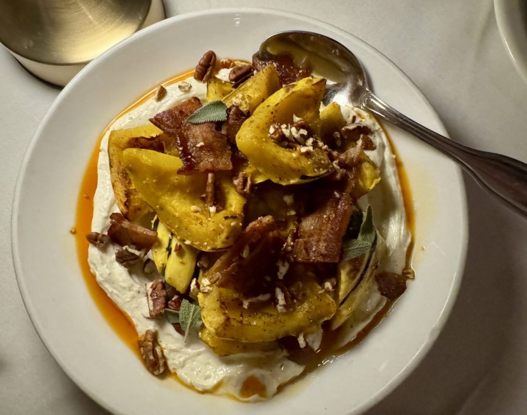 A plate of roasted delicata squash.