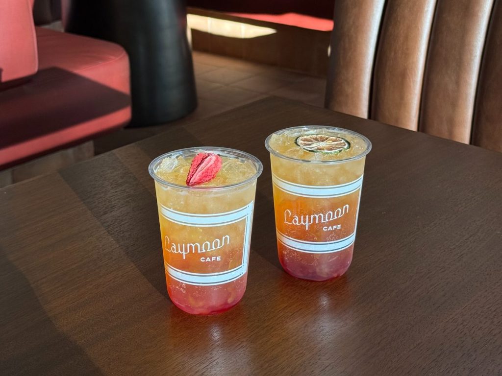 Two energy drinks on a table.