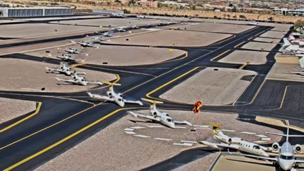 a timelapse photo showing a plane veering off a runway into another jet
