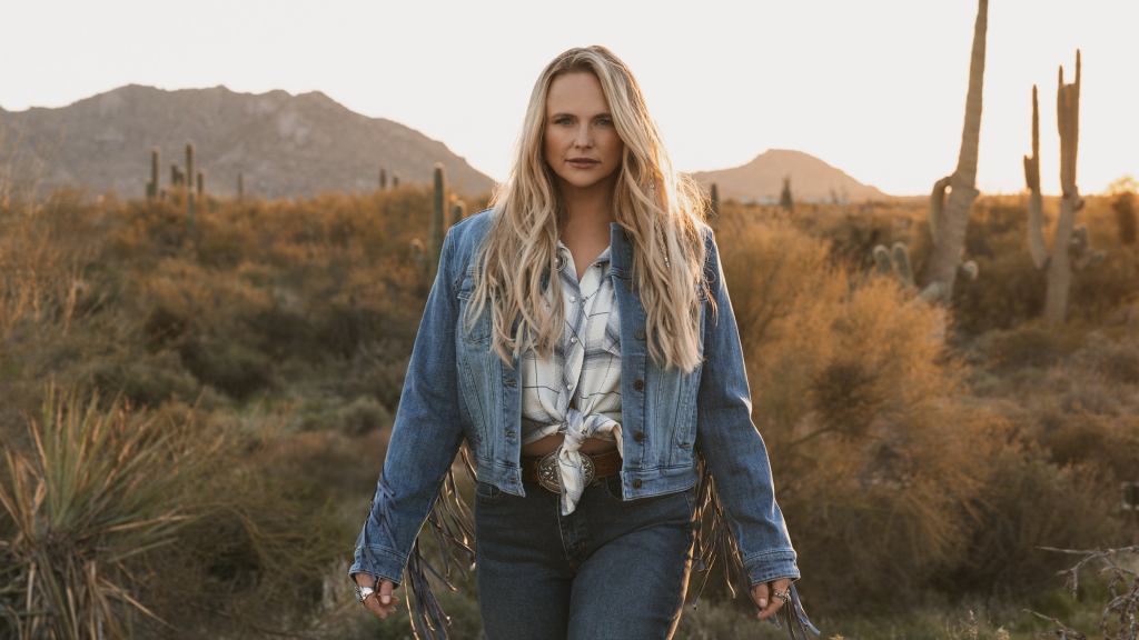 Trisha Yearwood poses for a promo photo in the desert.