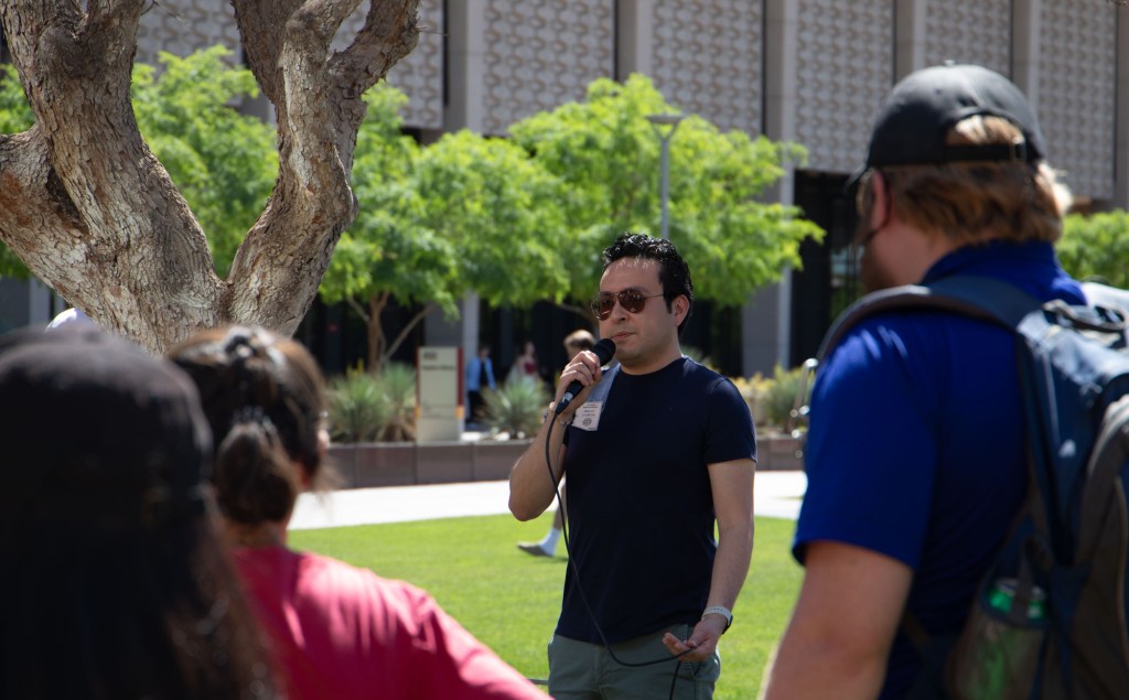 state rep. brian garcia speaks to protesters