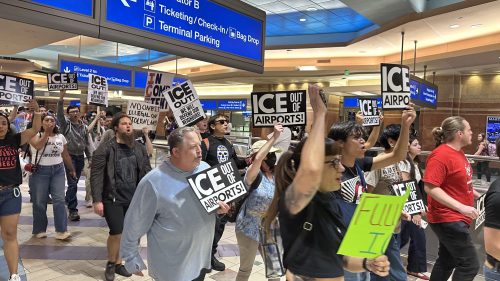 Demonstrators march through Sky Harbor to protest ICE