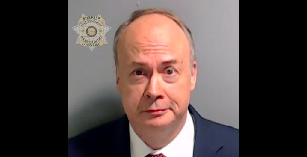 a sheriff's office booking photo of jeffrey clark