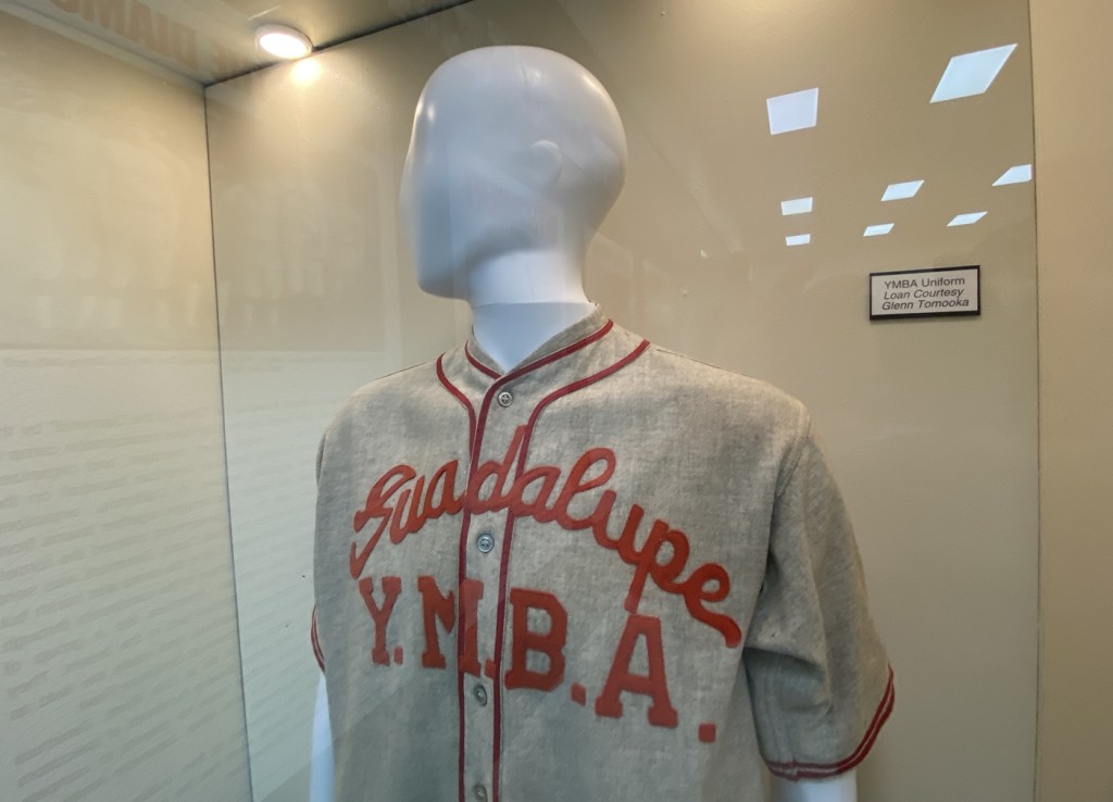 Wool baseball uniform from the Guadalupe Young Men’s Buddhist Association, a Japanese American team that played in World War II-era internment camps at the Arizona Baseball Museum in Mesa.