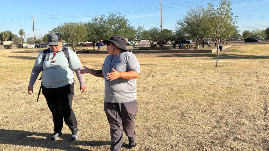 brenda madril and maritza arias walk in a park and talk to each other