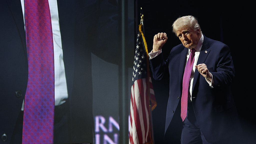 donald trump dances on a stage