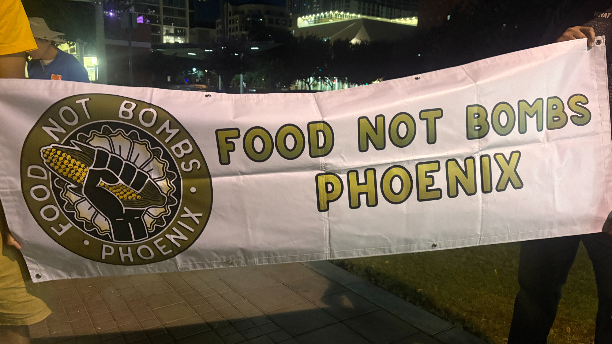a banner for Food Not Bombs PHX