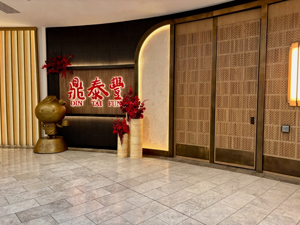 The entrance and sign of Din Tai Fung in Scottsdale.