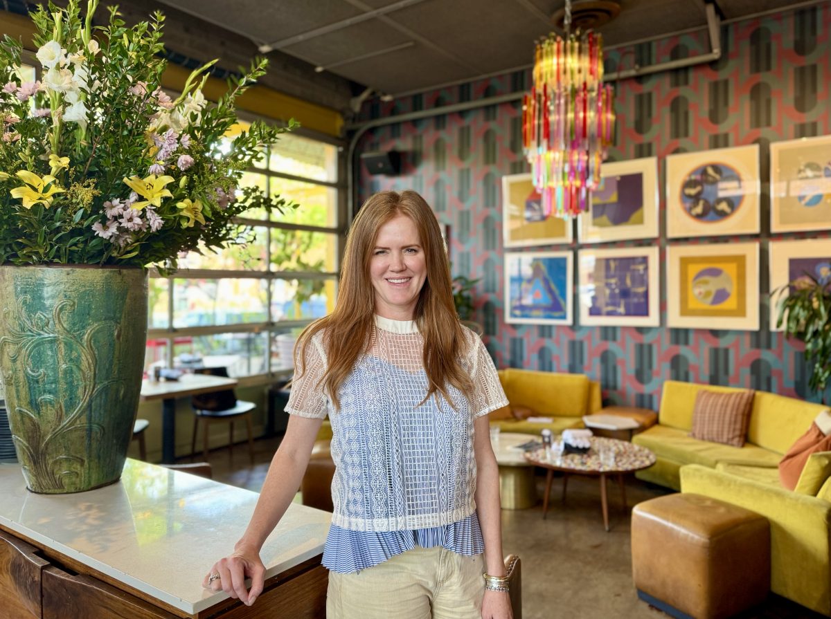 Lauren Bailey stands inside Postino Arcadia.