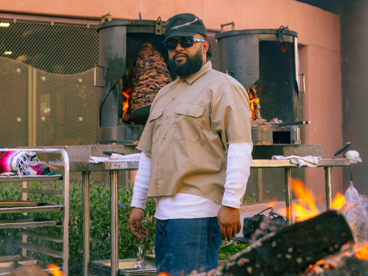 Chef Rene Andrade stands in front of a trompo at VIVA PHX.