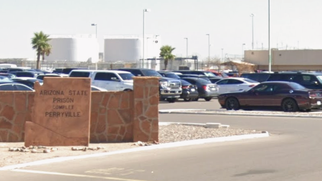 the entrance and parking lot at arizona state prison complex-perryville