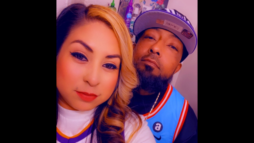 danielle and jesus flores pose for a selfie
