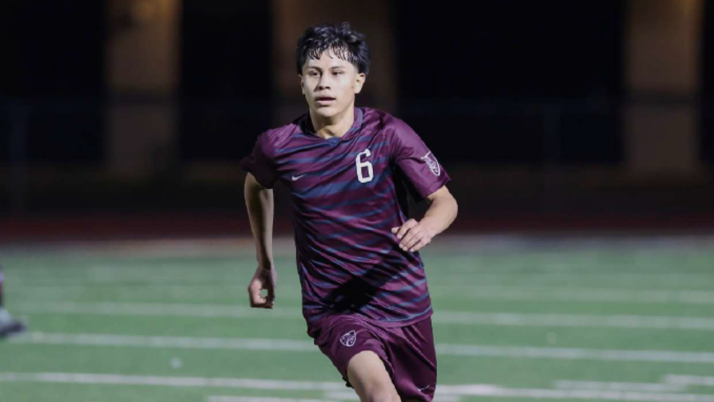 a man in a soccer jersey