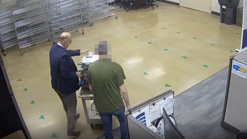 Video: Recorder employees snatch ballot scanner