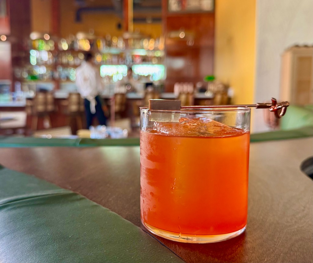 A cocktail in a rocks glass at Nadu.