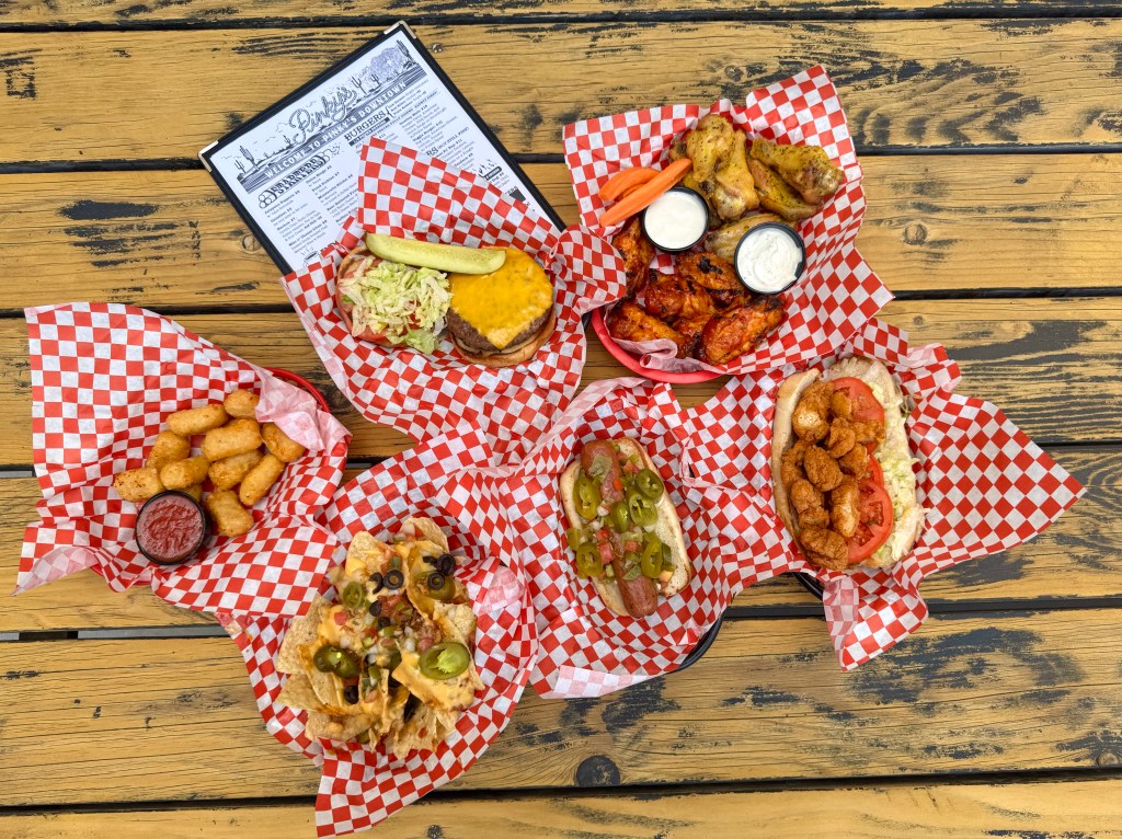 Several plates from Pinky's arranged on a table.e
