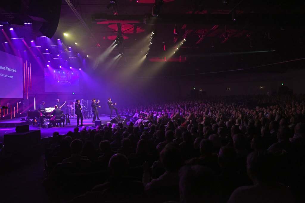 Audience members watch a live performance during an Arizona Musicfest concert in Scottsdale.