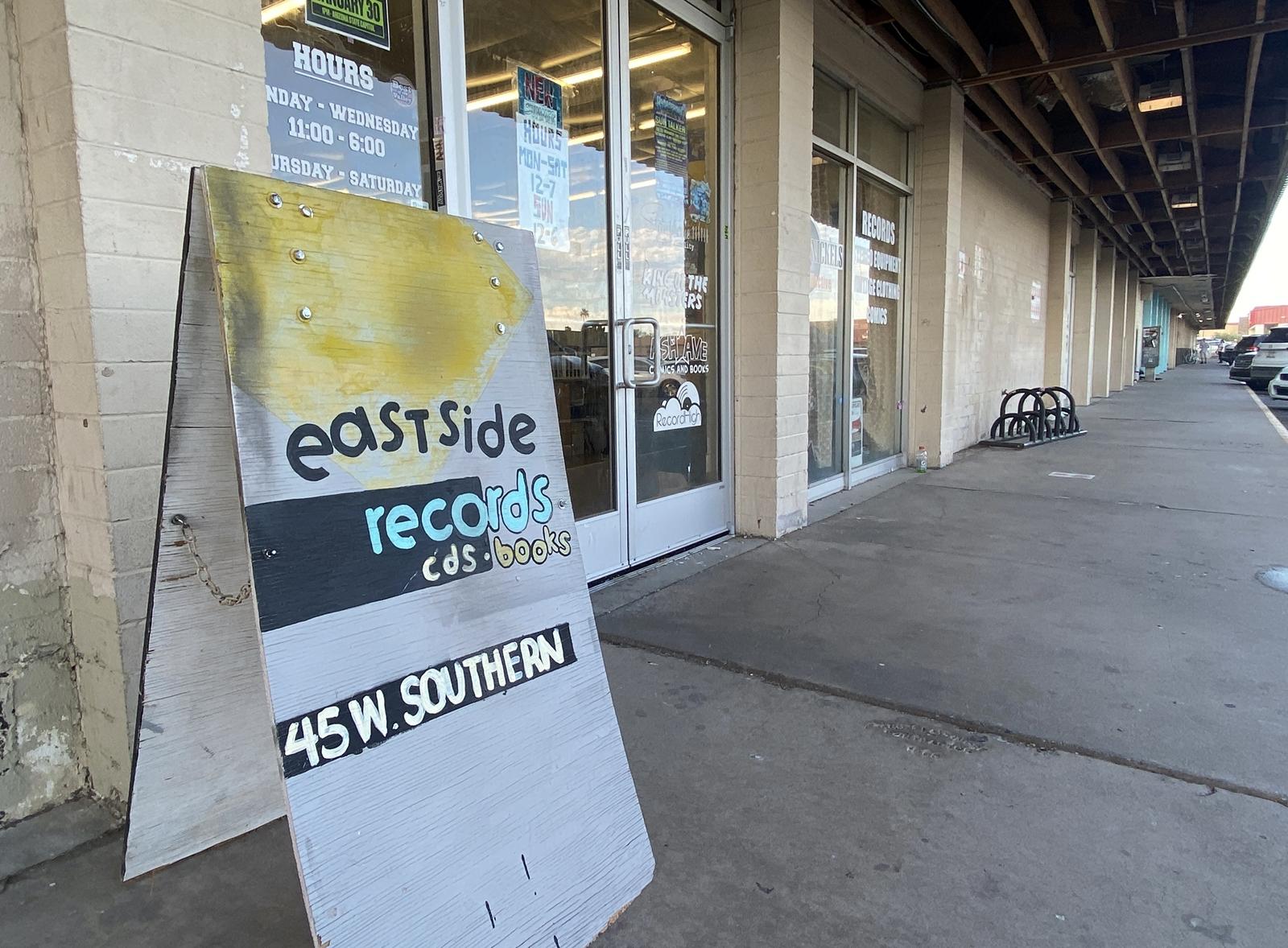 The exterior of The Ghost of Eastside Records in Tempe, including the storefront entrance and an Eastside Records sandwich board sign at 45 W. Southern Ave.
