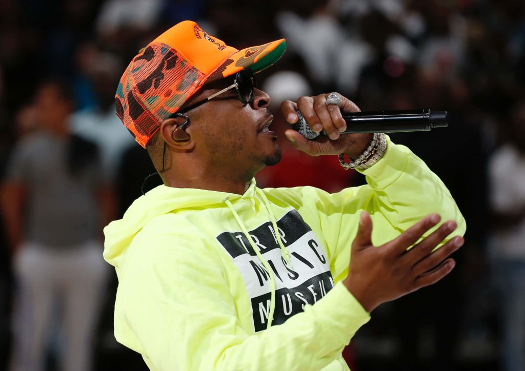 Rapper T.I. performs with a microphone during a live appearance in 2019. He is scheduled to perform at The Van Buren in Phoenix in 2026.