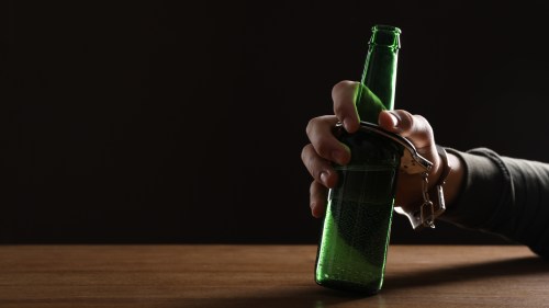 Board to probe ex-cop who gave handcuffed man liquor