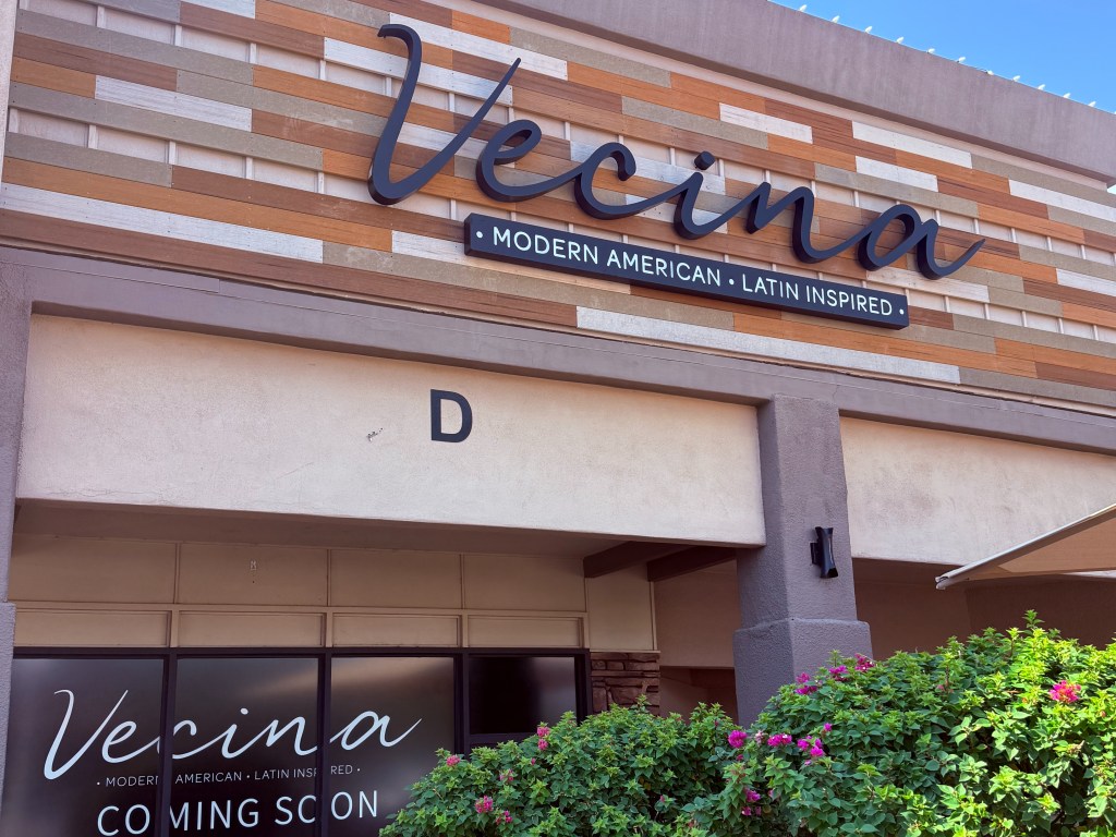 The sign outside Vecina in Scottsdale