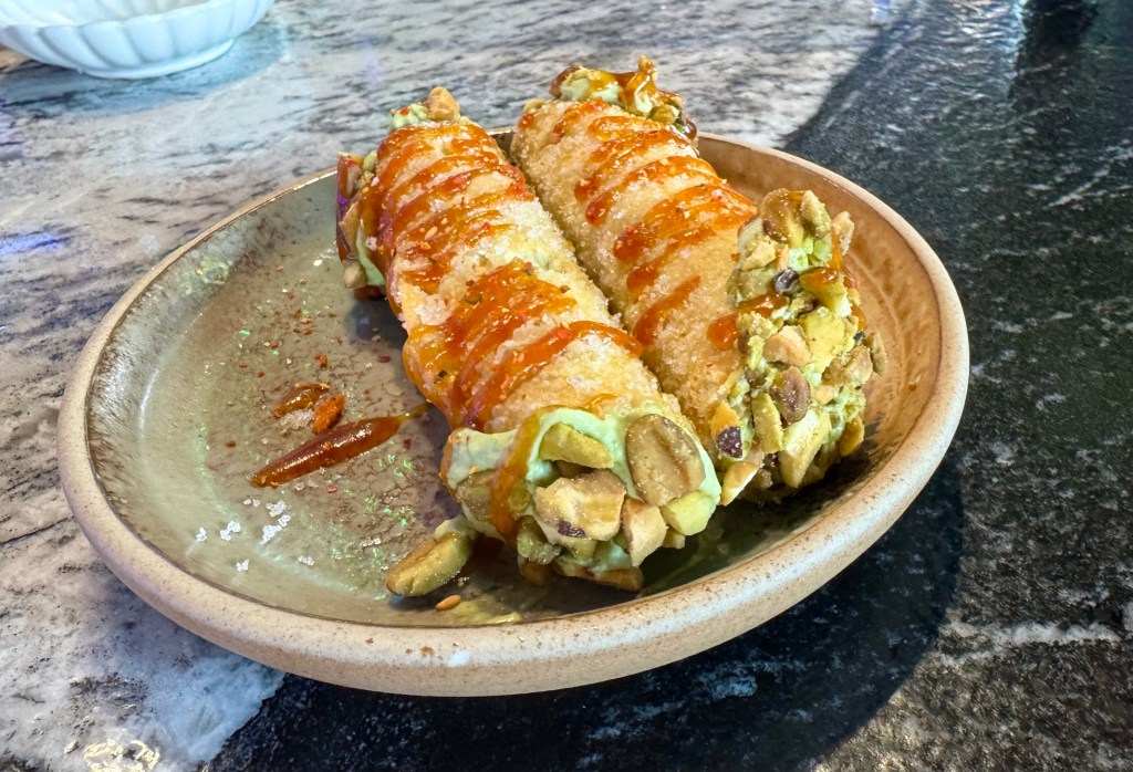 Two cannoli on a plate at Kanoki.