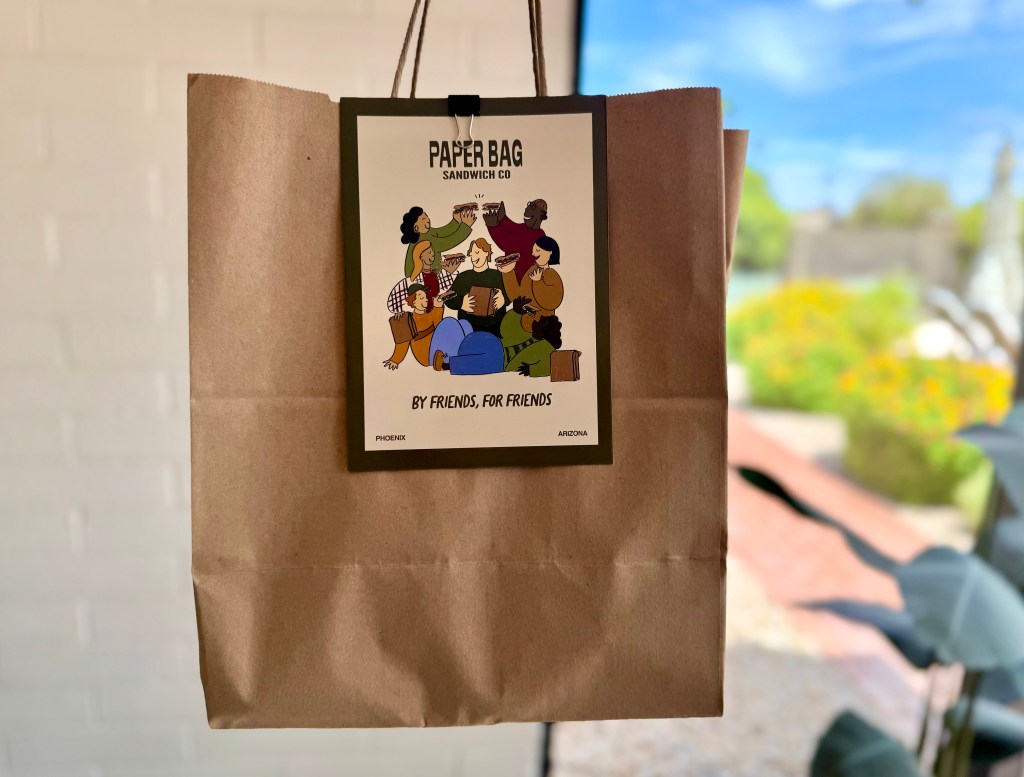A brown to-go bag from Paper Bag Sandwich Co.