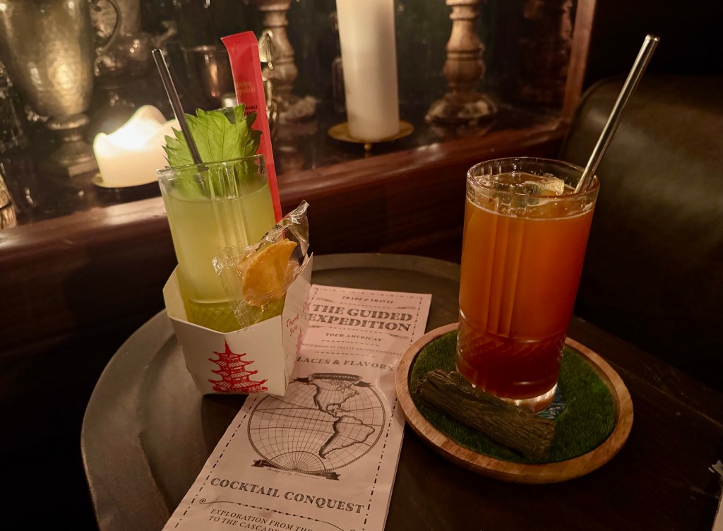 Two cocktails on a table at Trophy Room.