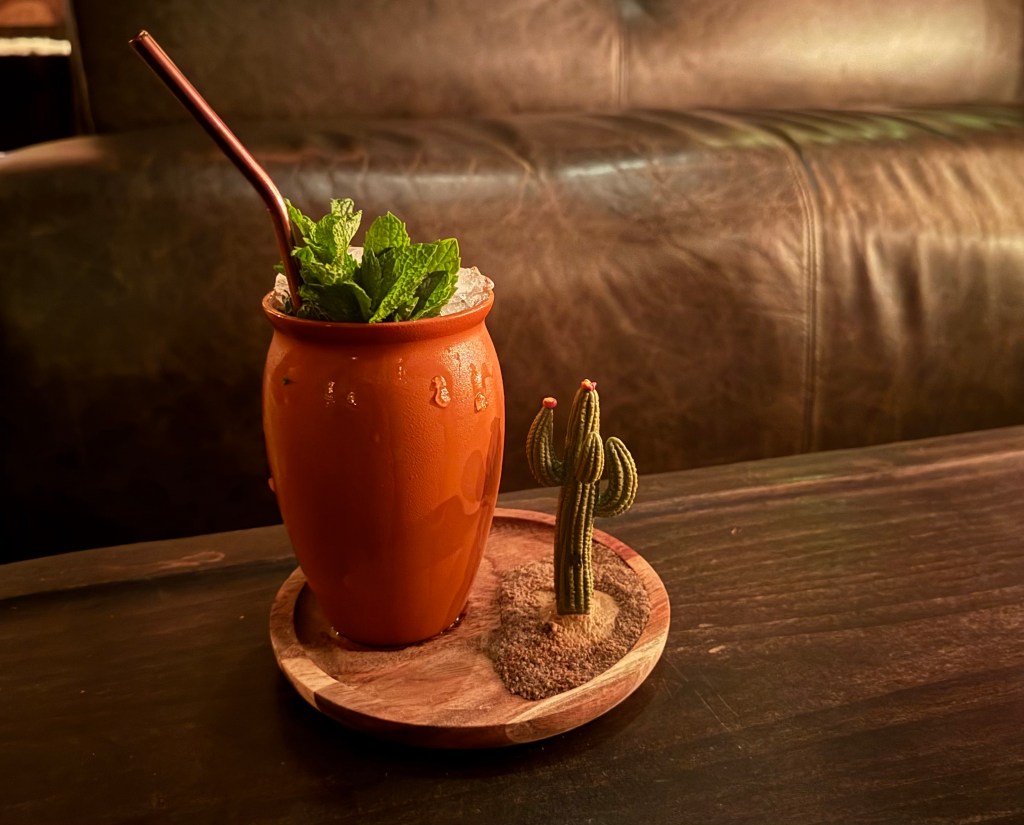 The Village of Hatch cocktail from Trophy Room is served in a cantarito.