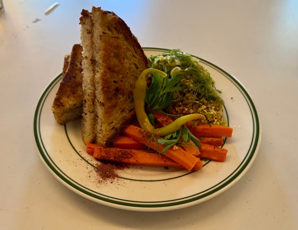 A plate with leek dip, toast points and pickled vegetables from Matilda's in Phoenix.