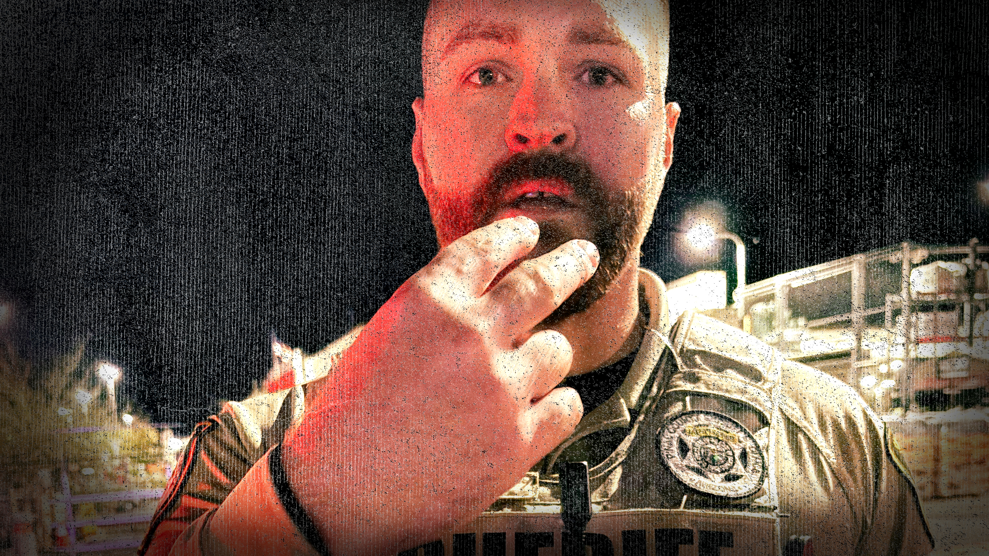 pinal county sheriff's deputy aaron mcrae points at his own face